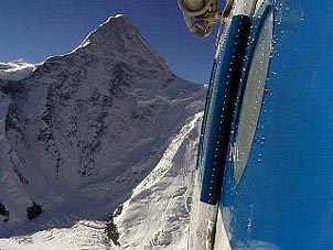 Helicoptering to Khan Tengri (7,010m) - the perfect pyramid. Copyright: Rick Hudson.