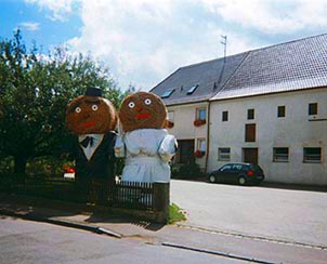 A pair of happily-married haystacks watched over my route. Copyright: Tyson Brooks.