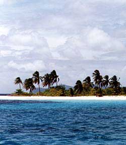A deserted islet awaits peace-seeking picnickers. Copyright Jim Johnson.