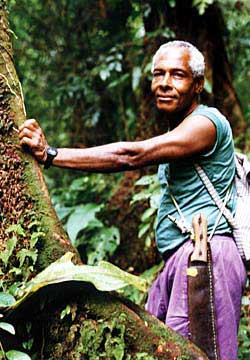 Rainforest guide Telfor Bedeau sets off on an eight-hour hike, machete at the ready. Copyright Jim Johnson.